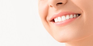close up of woman's smile showing off teeth