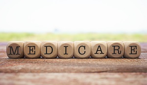 medicare spelled out in wood blocks